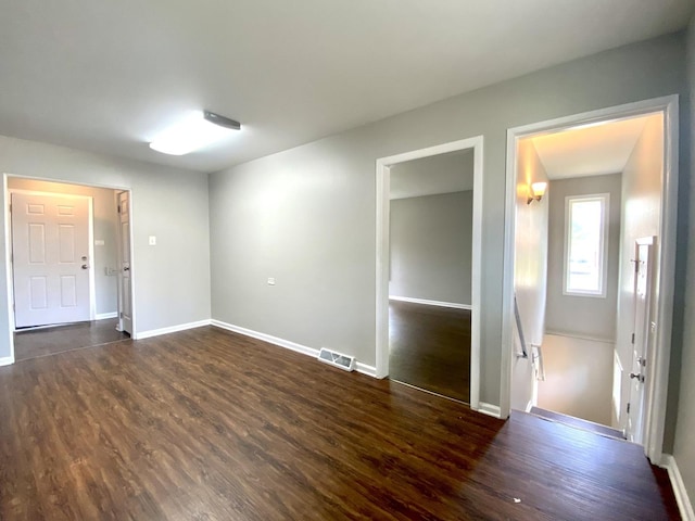 16009 Debbie Ln, South Holland, IL 60473 - spare room with dark wood-style floors and baseboards