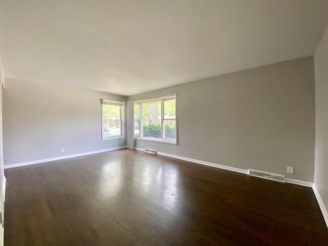 16009 Debbie Ln, South Holland, IL 60473 - unfurnished room featuring baseboards and dark wood-style flooring