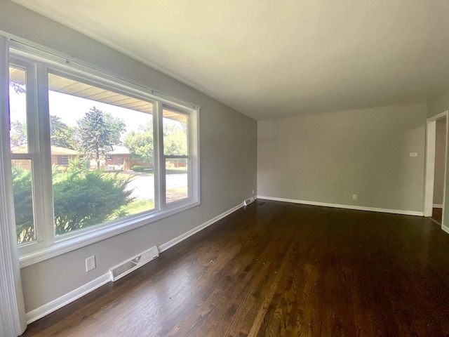 16009 Debbie Ln, South Holland, IL 60473 - spare room with dark wood finished floors and baseboards
