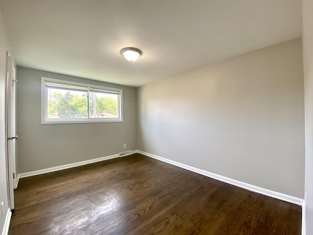16009 Debbie Ln, South Holland, IL 60473 - empty room featuring baseboards and dark wood finished floors