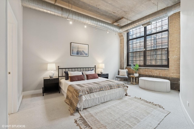 17 N Loomis St Unit 1C, Chicago, IL 60607 - bedroom with baseboards and carpet