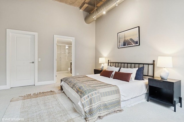 17 N Loomis St Unit 1C, Chicago, IL 60607 - bedroom featuring carpet floors, ensuite bathroom, and a towering ceiling
