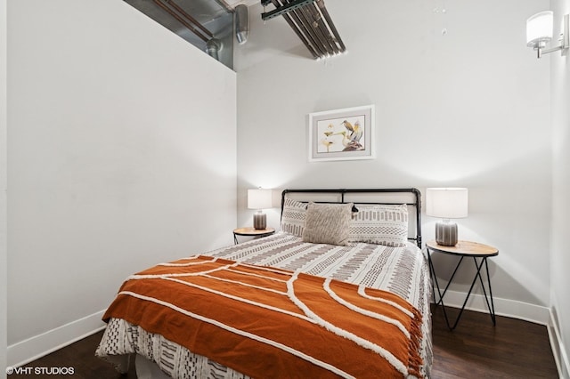 17 N Loomis St Unit 1C, Chicago, IL 60607 - bedroom with baseboards and wood finished floors