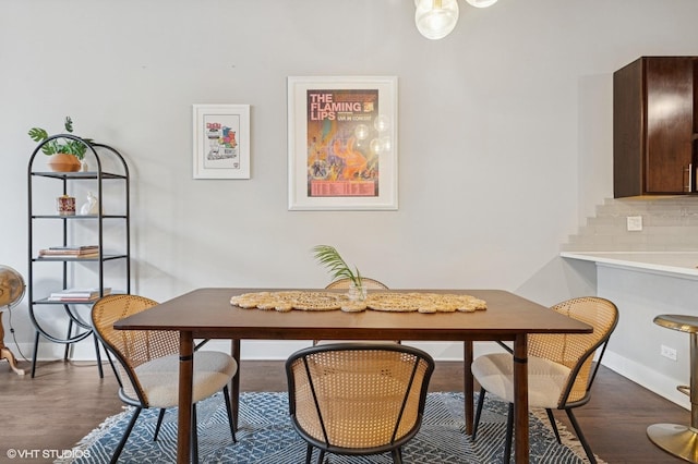 17 N Loomis St Unit 1C, Chicago, IL 60607 - dining space with dark wood-style flooring and baseboards