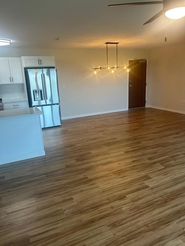200 Park Ave Unit 634, Calumet City, IL 60409 - unfurnished living room with wood finished floors and a ceiling fan