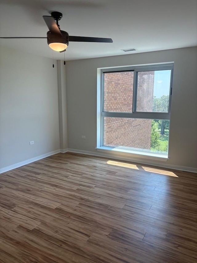 200 Park Ave Unit 634, Calumet City, IL 60409 - spare room featuring wood finished floors and a ceiling fan
