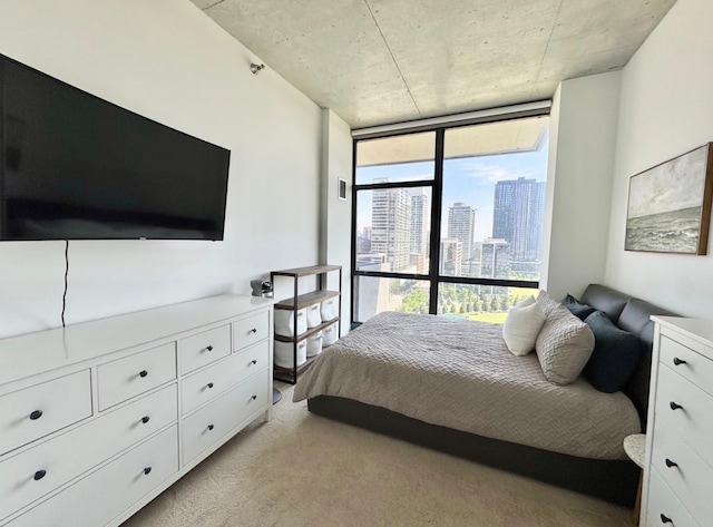 235 W Van Buren St Unit 1703, Chicago, IL 60607 - bedroom with floor to ceiling windows, a skyline view, and light colored carpet