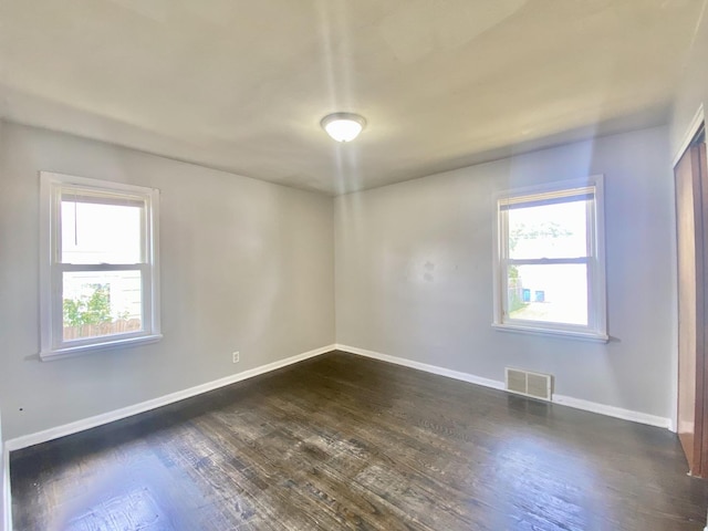 518 156th Pl, Calumet City, IL 60409 - spare room featuring dark wood-style floors