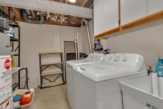 16620 Grants Trl, Orland Park, IL 60467 - laundry area with washer and clothes dryer and cabinet space