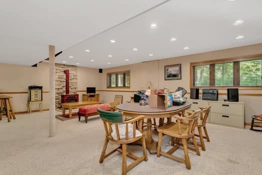 16620 Grants Trl, Orland Park, IL 60467 - dining room featuring light carpet, recessed lighting, and a wood stove