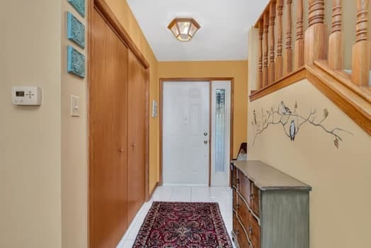 16620 Grants Trl, Orland Park, IL 60467 - foyer entrance featuring light tile patterned floors