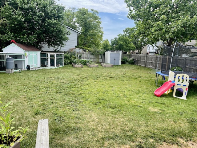 7347 W Benton Dr, Frankfort, IL 60423 - fenced backyard featuring a trampoline and a shed