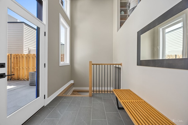 1642 W Wolfram St, Chicago, IL 60657 - hallway with a high ceiling and tile patterned flooring
