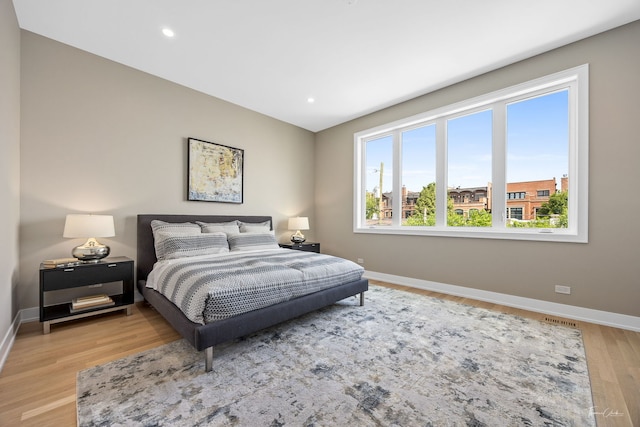 1642 W Wolfram St, Chicago, IL 60657 - bedroom with light wood-type flooring and recessed lighting