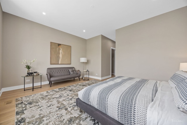 1642 W Wolfram St, Chicago, IL 60657 - bedroom with light wood-style flooring and recessed lighting