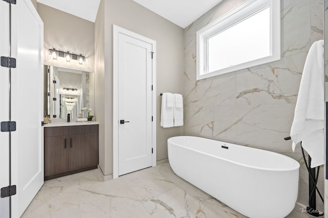 1642 W Wolfram St, Chicago, IL 60657 - full bathroom featuring marble tiled flooring, vanity, and a soaking tub