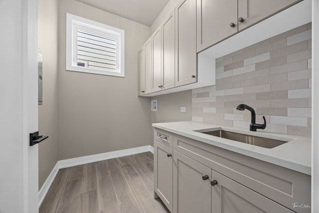1642 W Wolfram St, Chicago, IL 60657 - laundry room with hookup for a washing machine, cabinet space, and wood finished floors