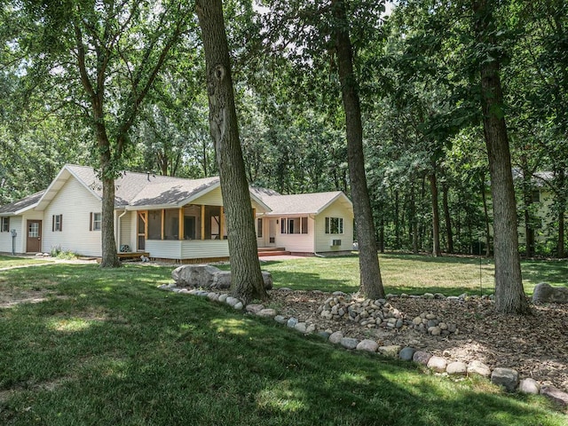 26 N Deer Lk, Villa Grove, IL 61956 - ranch-style home with a sunroom and a front lawn