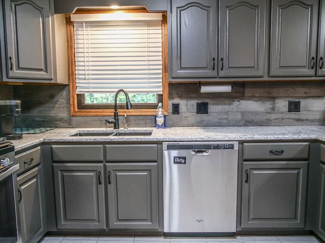 26 N Deer Lk, Villa Grove, IL 61956 - kitchen featuring stainless steel appliances, gray cabinetry, and tasteful backsplash