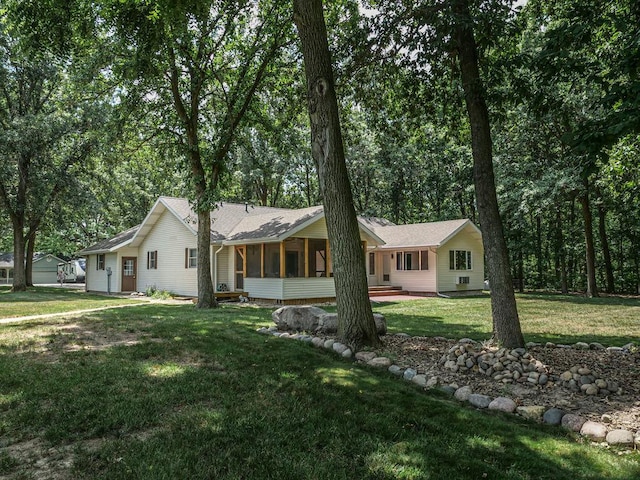 26 N Deer Lk, Villa Grove, IL 61956 - ranch-style home with a sunroom and a front yard