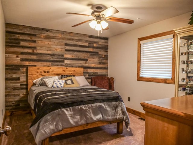 26 N Deer Lk, Villa Grove, IL 61956 - bedroom with wood walls, carpet floors, and ceiling fan