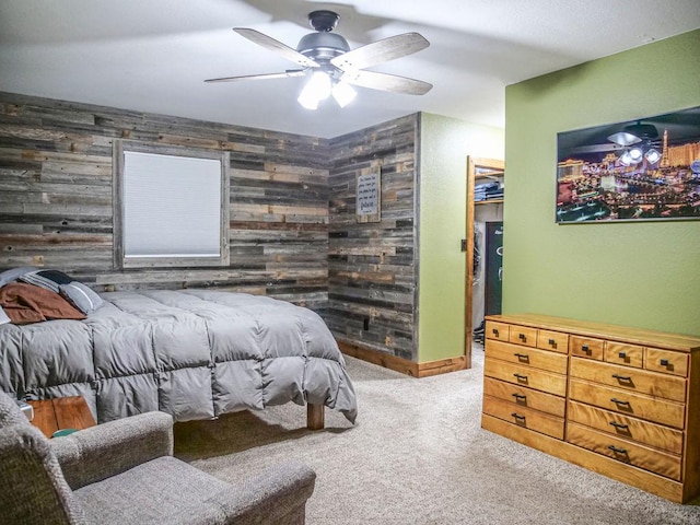 26 N Deer Lk, Villa Grove, IL 61956 - carpeted bedroom featuring wood walls, a spacious closet, and ceiling fan