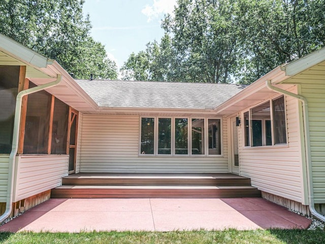 26 N Deer Lk, Villa Grove, IL 61956 - view of exterior entry featuring roof with shingles