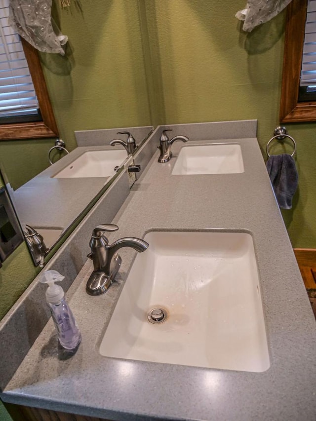26 N Deer Lk, Villa Grove, IL 61956 - bathroom featuring double vanity