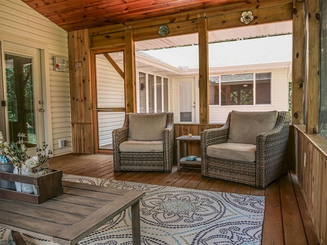 26 N Deer Lk, Villa Grove, IL 61956 - sunroom / solarium with hardwood / wood-style floors, vaulted ceiling, wooden walls, wood ceiling, and a deck
