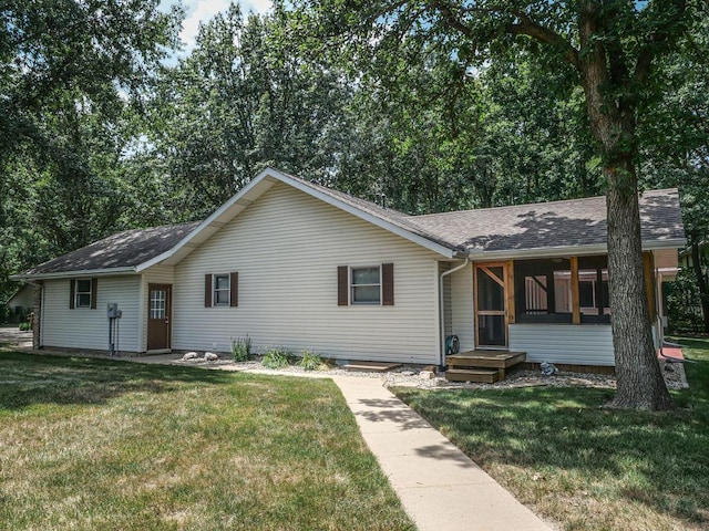 26 N Deer Lk, Villa Grove, IL 61956 - ranch-style house with a front lawn and roof with shingles