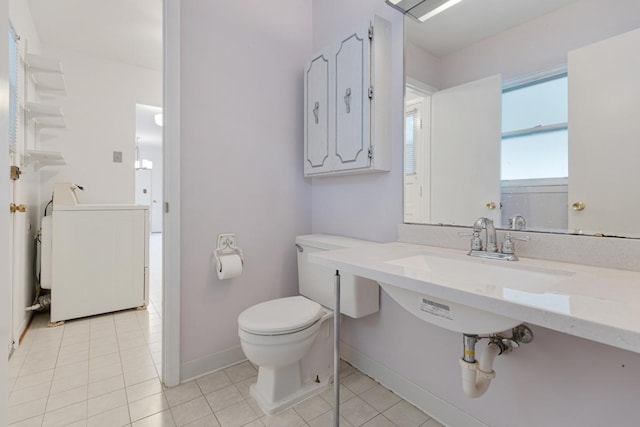 1108 Lancaster Ave, Elk Grove Village, IL 60007 - bathroom with washer / dryer and tile patterned floors