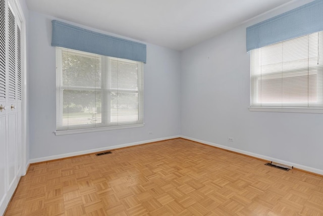 1108 Lancaster Ave, Elk Grove Village, IL 60007 - unfurnished bedroom with multiple windows and a closet