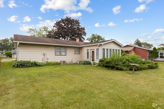 1108 Lancaster Ave, Elk Grove Village, IL 60007 - rear view of property with a lawn and a chimney