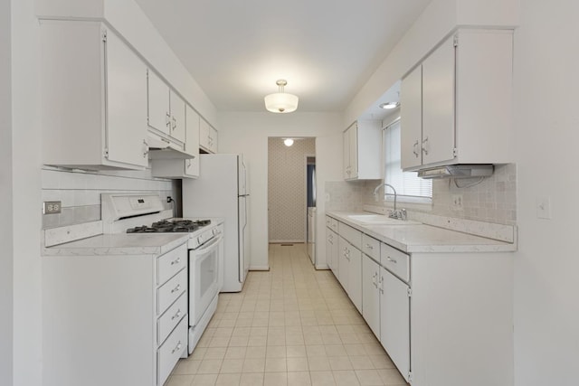 1108 Lancaster Ave, Elk Grove Village, IL 60007 - kitchen with white appliances, light countertops, decorative backsplash, white cabinets, and under cabinet range hood