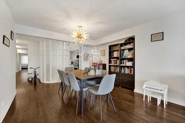1440 N Lake Shore Dr Unit 4Bd, Chicago, IL 60610 - dining area featuring a chandelier and dark wood-type flooring