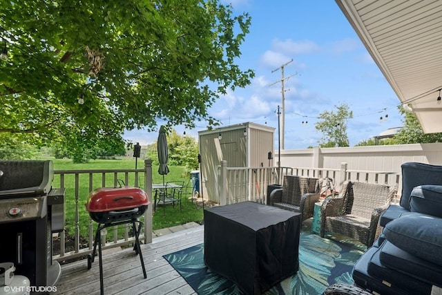 1117 Sausalito Ct Unit 1117, Bartlett, IL 60103 - wooden terrace featuring a grill, a shed, and a yard