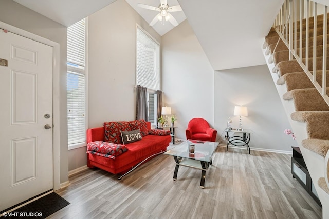 1117 Sausalito Ct Unit 1117, Bartlett, IL 60103 - living area featuring wood finished floors, healthy amount of natural light, a ceiling fan, and lofted ceiling