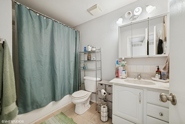 1117 Sausalito Ct Unit 1117, Bartlett, IL 60103 - bathroom with vanity, tile patterned floors, and shower / bath combo with shower curtain
