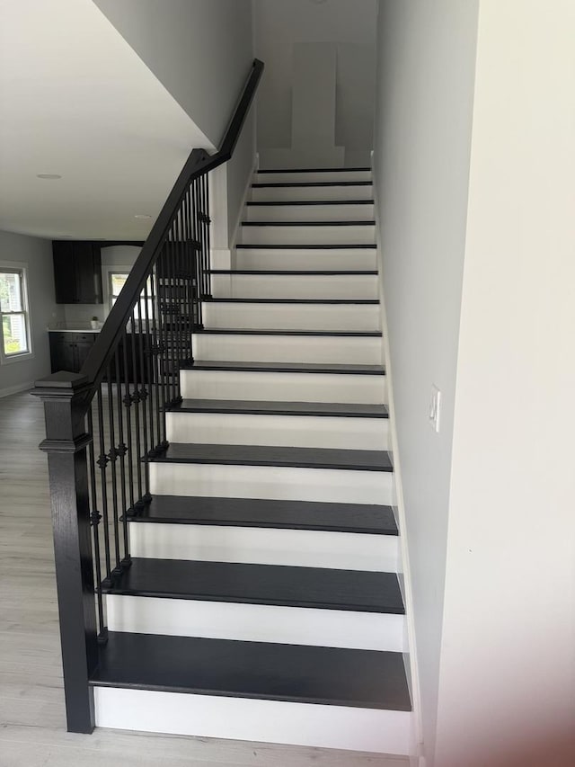 309 SE Circle Dr, Joliet, IL 60433 - stairs with wood finished floors and baseboards
