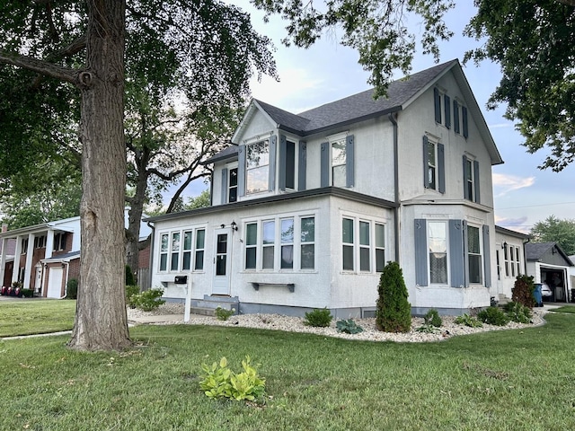 2603 3rd St, Peru, IL 61354 - view of front facade with a front yard and stucco siding