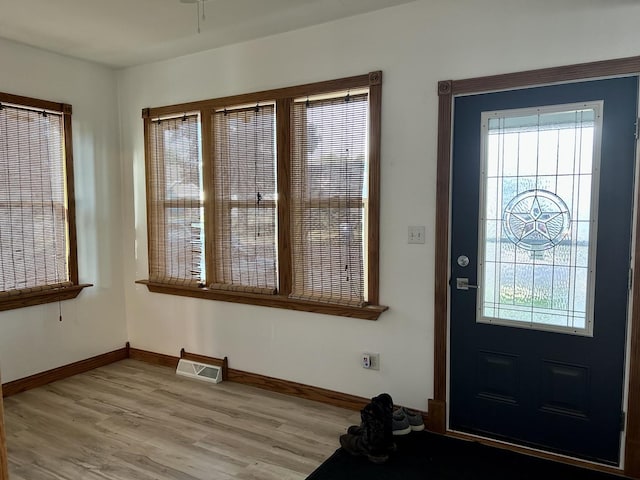 2603 3rd St, Peru, IL 61354 - foyer entrance with light wood-style floors and healthy amount of natural light