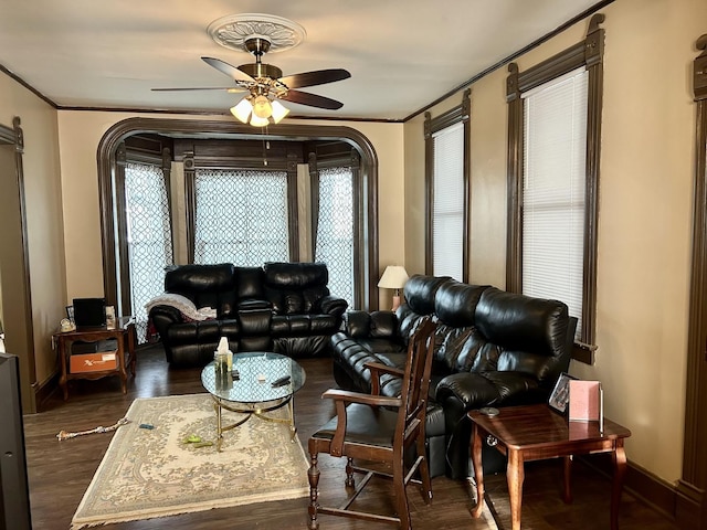 2603 3rd St, Peru, IL 61354 - living room featuring ceiling fan, wood finished floors, ornamental molding, and arched walkways
