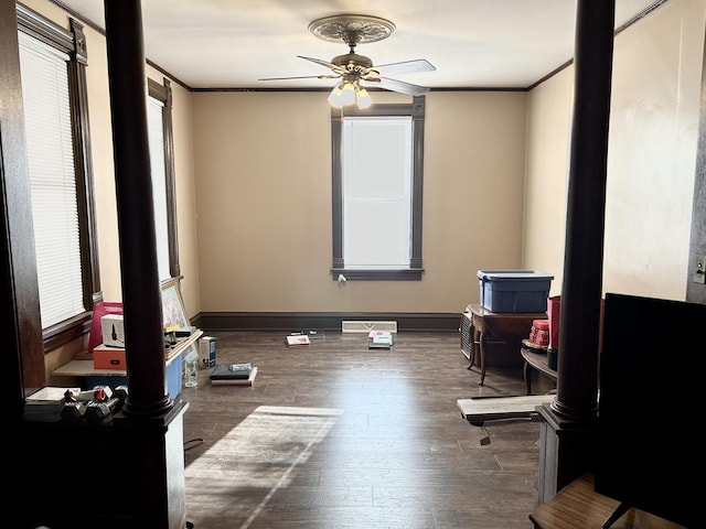 2603 3rd St, Peru, IL 61354 - interior space with wood finished floors, crown molding, and a ceiling fan