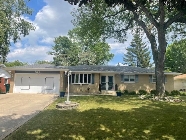 512 Tana Ln, Joliet, IL 60435 - single story home featuring a garage, concrete driveway, a front yard, french doors, and entry steps