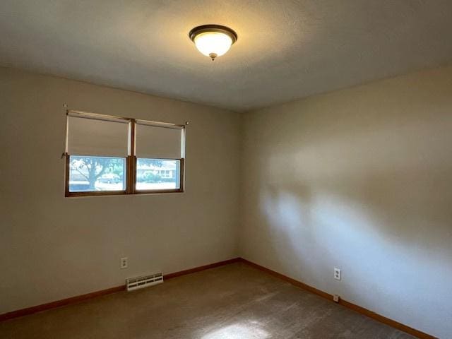 512 Tana Ln, Joliet, IL 60435 - carpeted spare room featuring baseboards