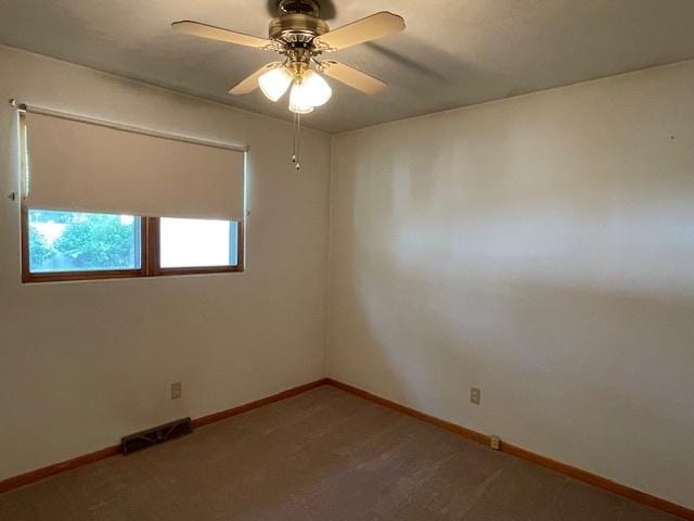 512 Tana Ln, Joliet, IL 60435 - carpeted empty room with baseboards and ceiling fan