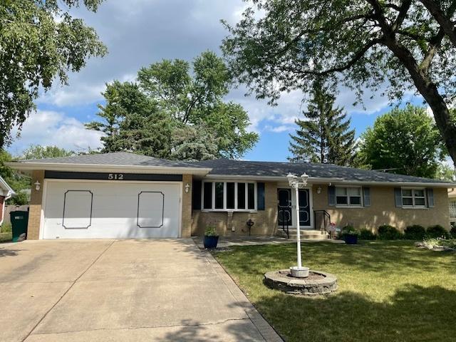 512 Tana Ln, Joliet, IL 60435 - ranch-style home featuring a garage, driveway, and a front yard