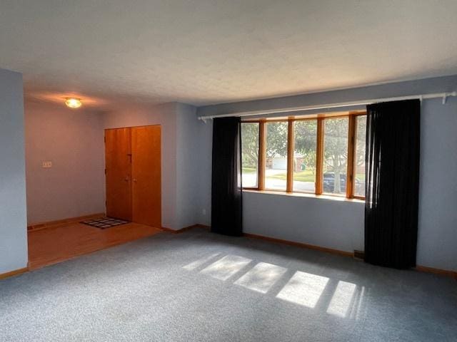512 Tana Ln, Joliet, IL 60435 - unfurnished room with carpet and baseboards