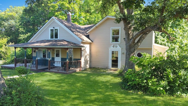 725 Opal St, Marseilles, IL 61341 - view of front facade featuring a front lawn and a porch