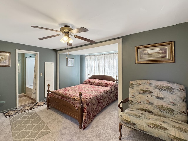 725 Opal St, Marseilles, IL 61341 - bedroom with light colored carpet, a ceiling fan, and connected bathroom